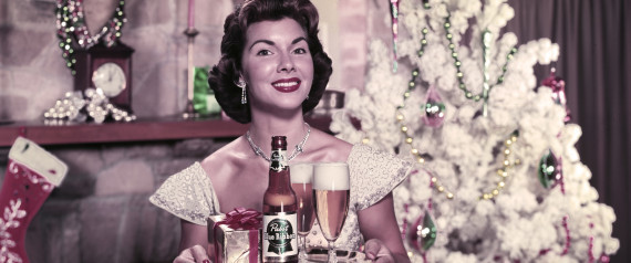 n-CHRISTMAS-TREE-NEXT-TO-A-FIREPLACE-WITH-A-BOTTLE-O-large570.jpg